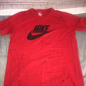 Red Nike shirt